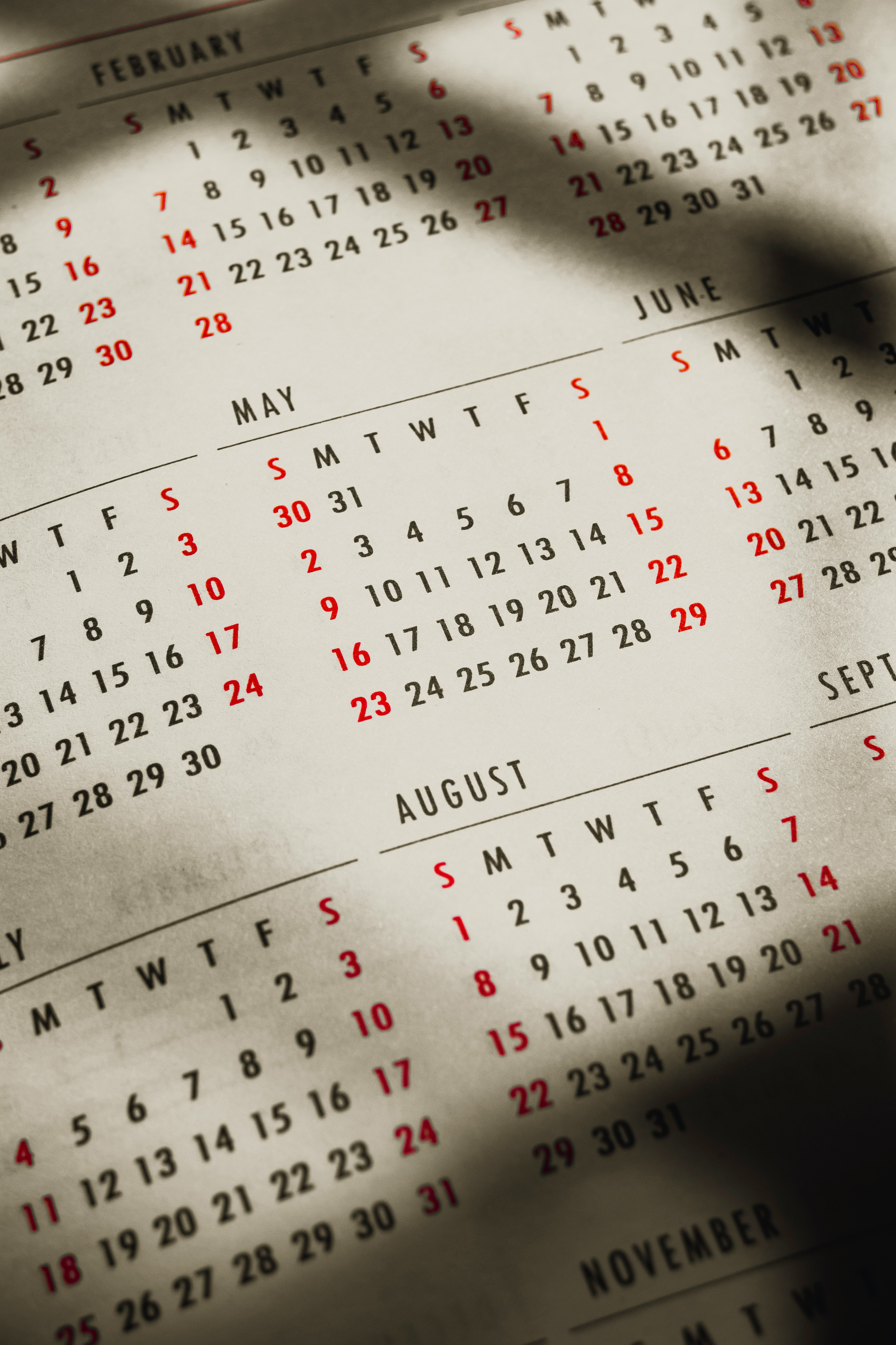 A calendar with dates circled in red marker