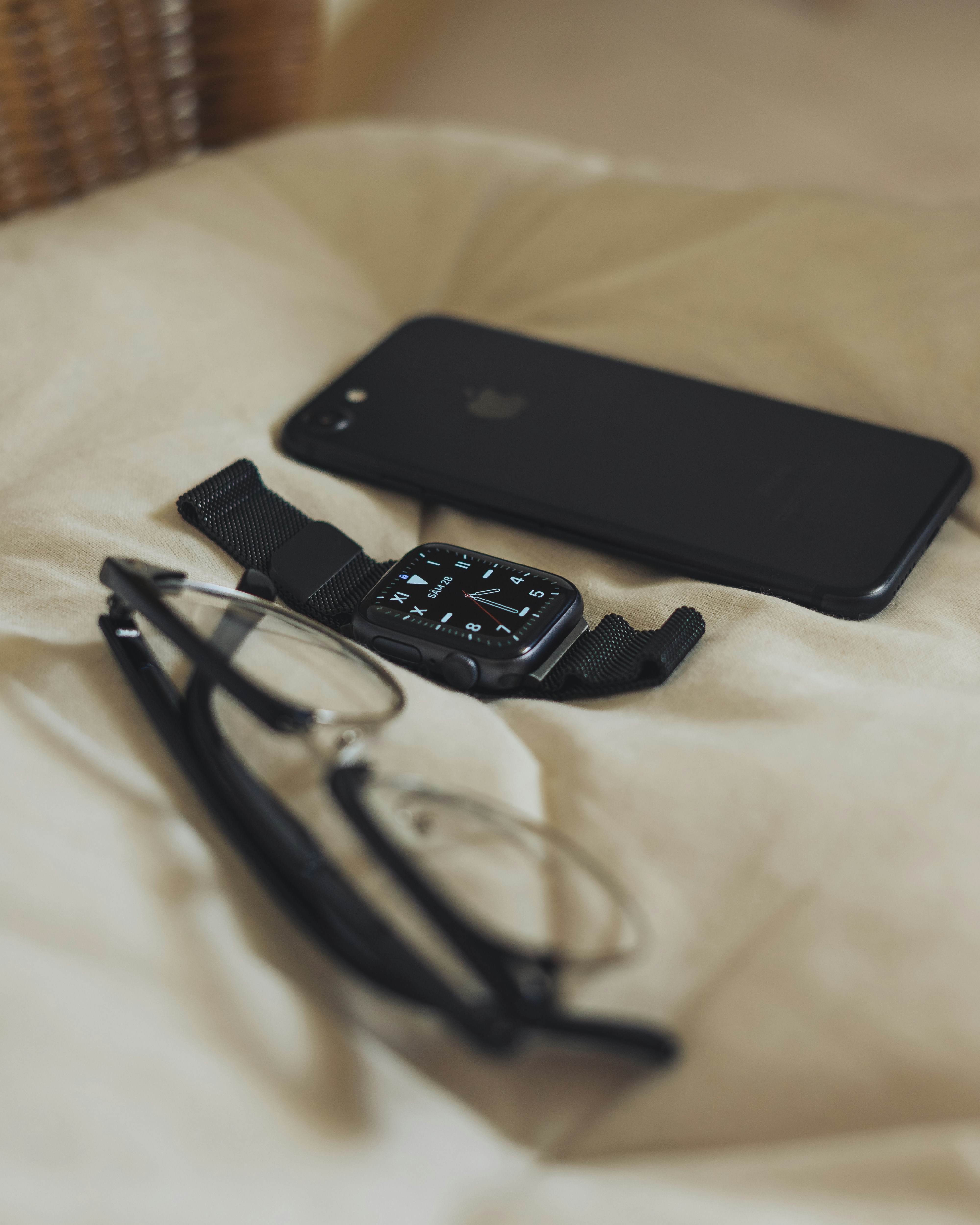 A smartphone resting on a black notebook showing an encrypted messaging app lock screen