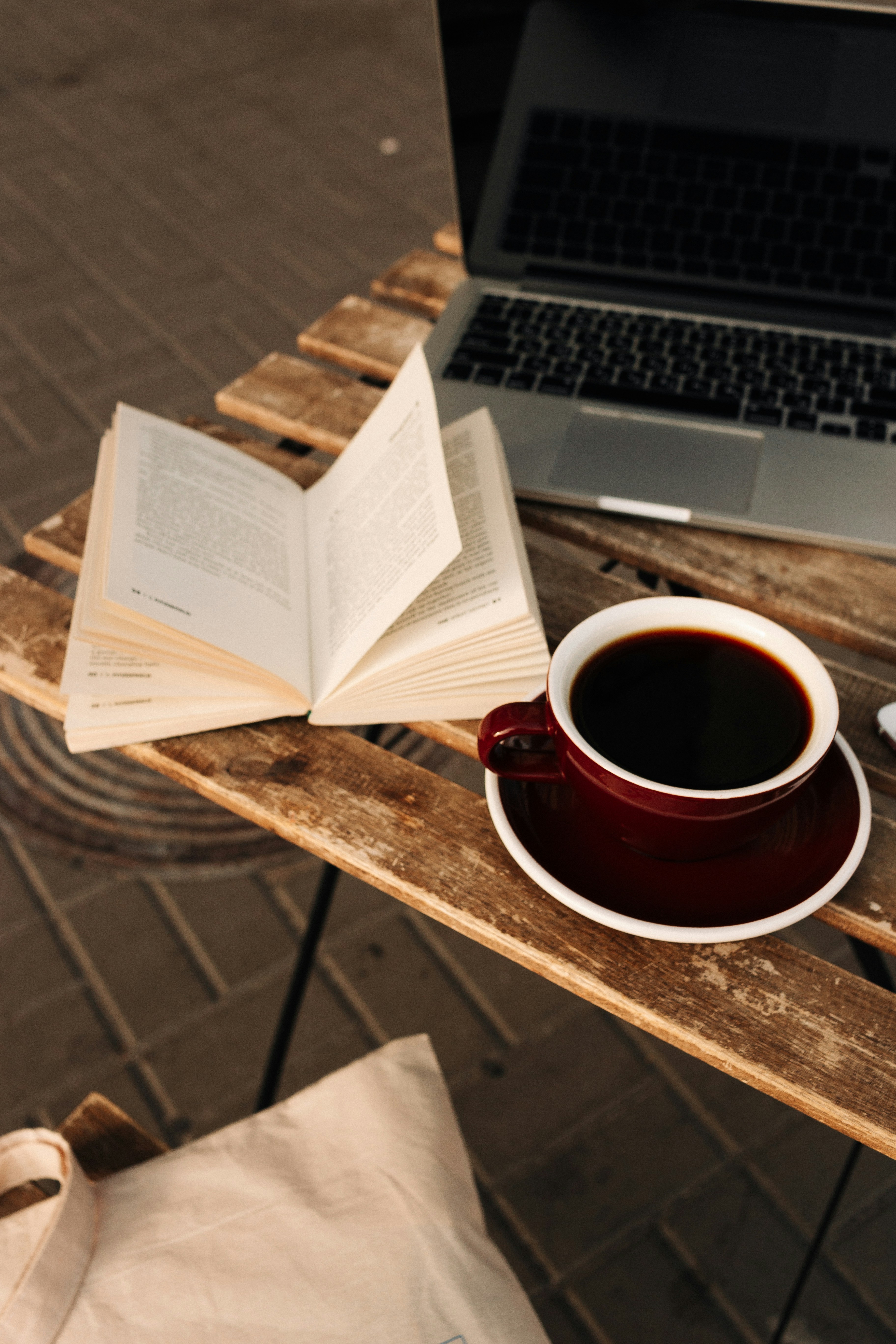 A macro shot of a dictionary page highlighting the word authenticity